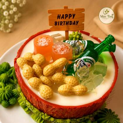 Bánh rau câu sinh nhật tạo hình trái dừa với chai bia và đậu phộng